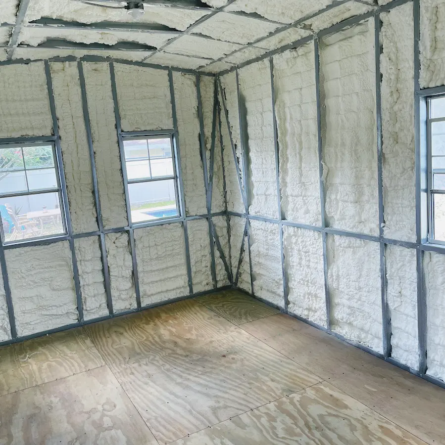 Closed-cell spray foam insulation applied to wall cavities in a residential project in New Burlington